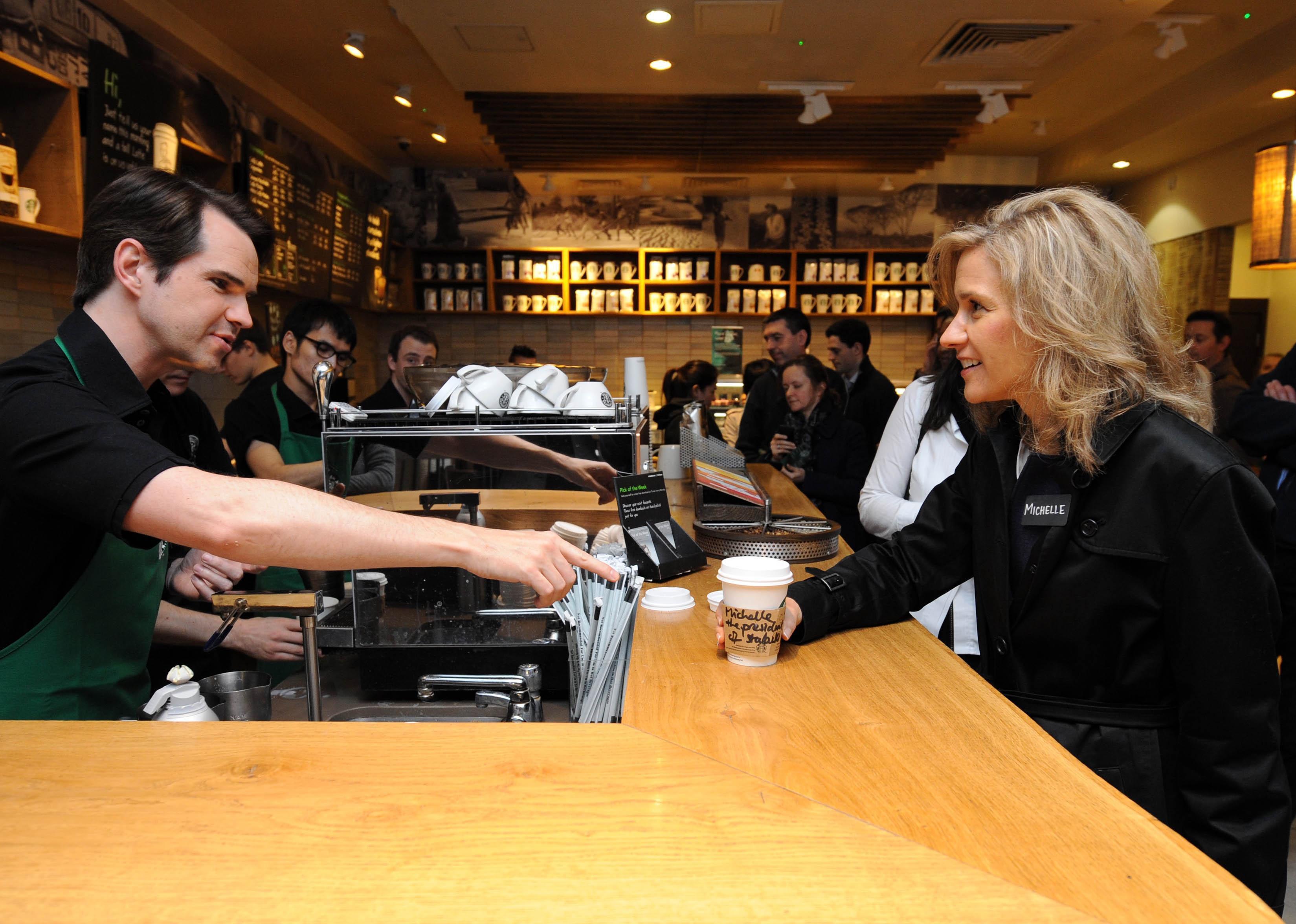 Michelle Gass gets a coffee at a coffee shop.