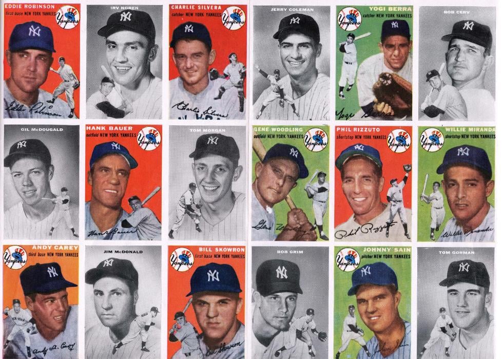Folded poster insert, from Topps Chewing Gum, features baseball cards that highlight members of the 1954 New York Yankees, New York, New York, August 23, 1954.