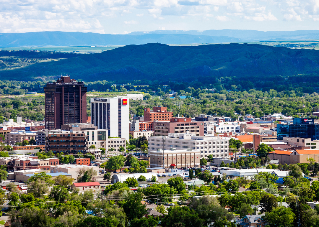 An aerial view of Billings with mountains in the background.