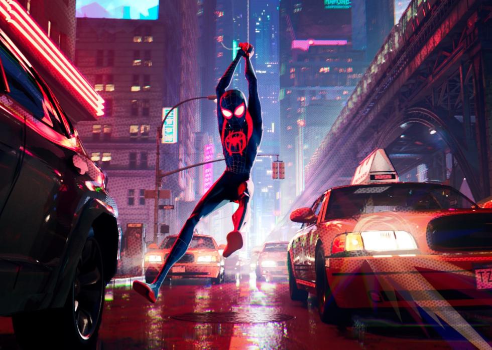 Cartoon image of spider man swinging through the city.