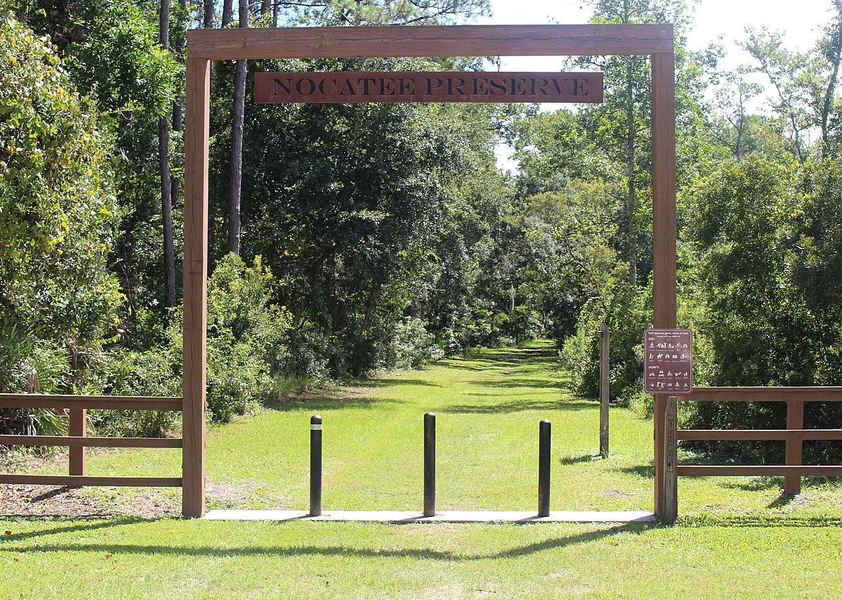 A wooden entrance sign to the Nocatee Preserve.