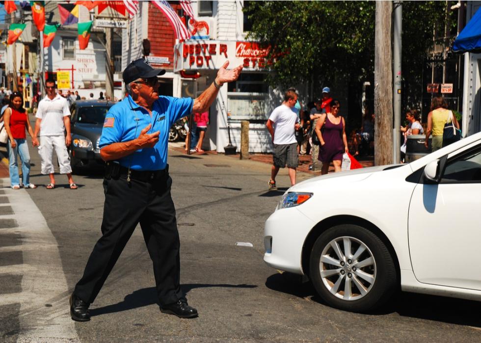 An officer directs traffic in Provincetown, Massachusetts.