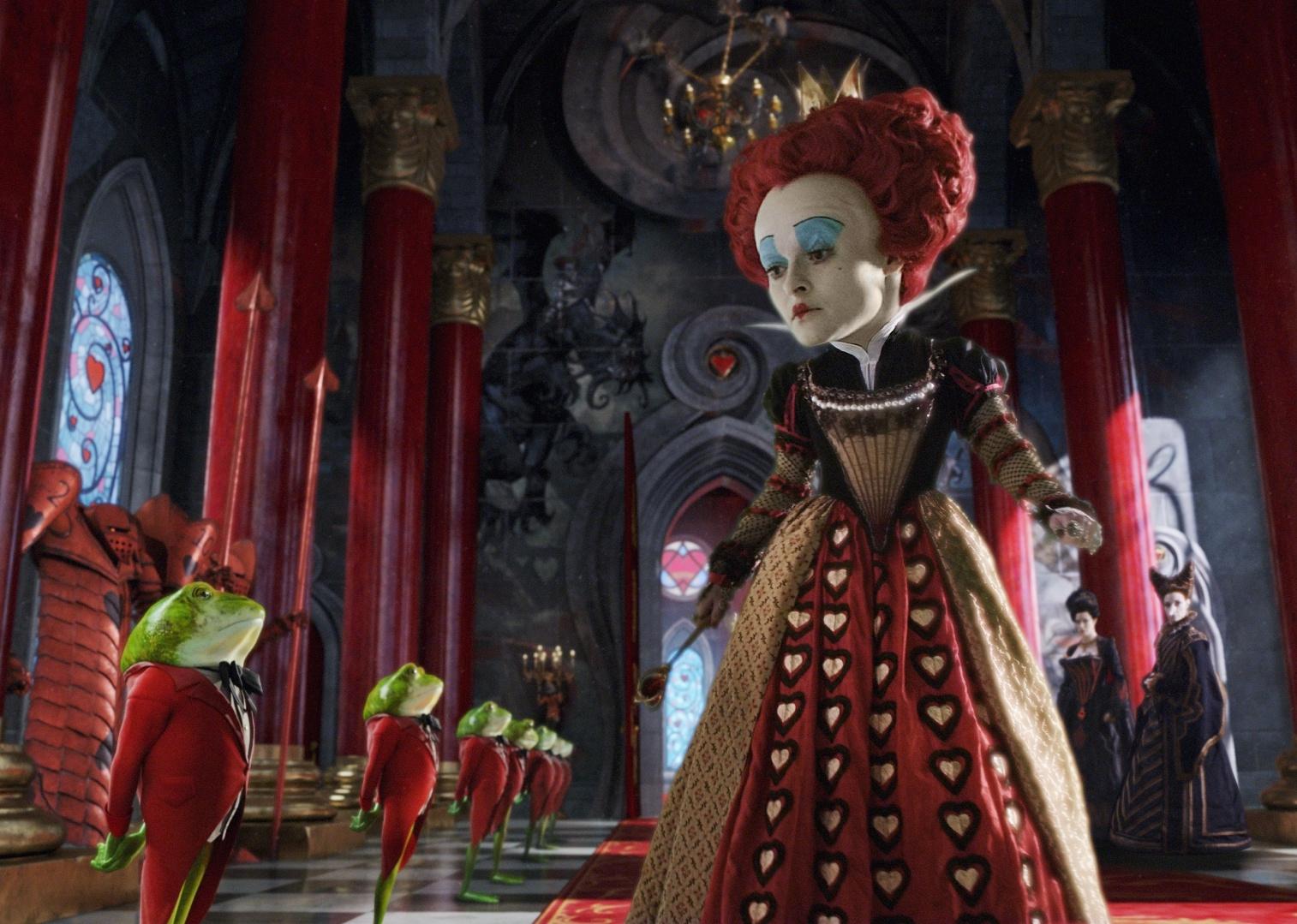 Helena Bonham Carter as the Queen of Hearts in a Palace hall lined with frogs in butler uniforms.