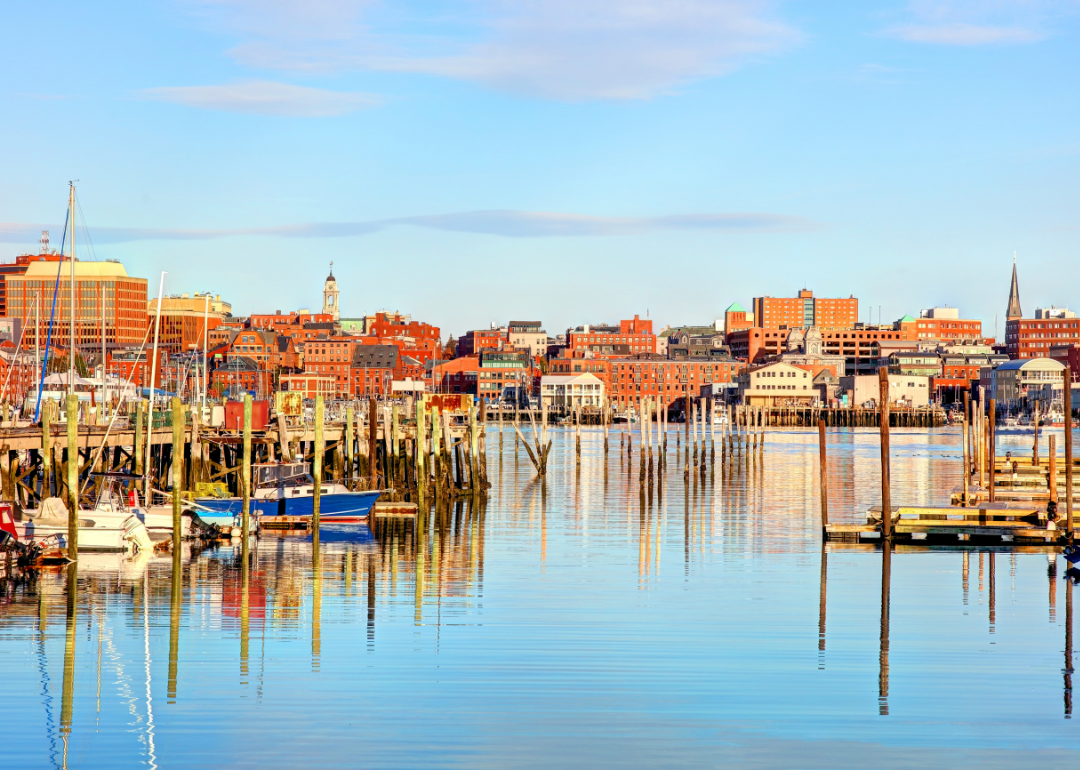 Boats on the water with Portland, Maine in the background.