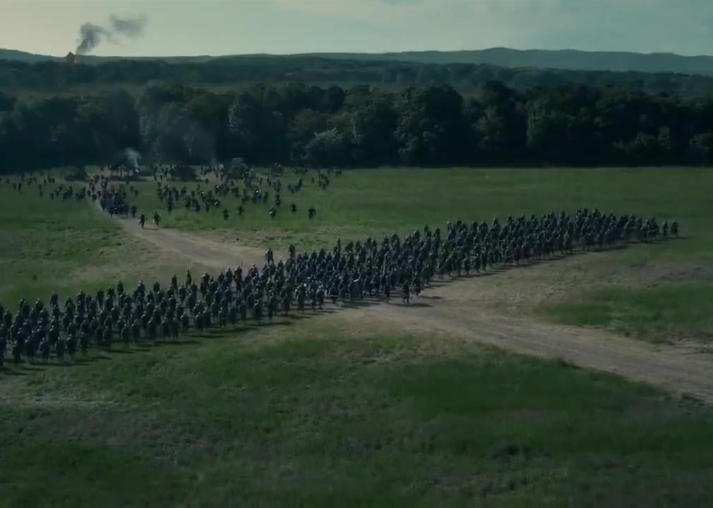 Rows of soldiers on a battlefield.