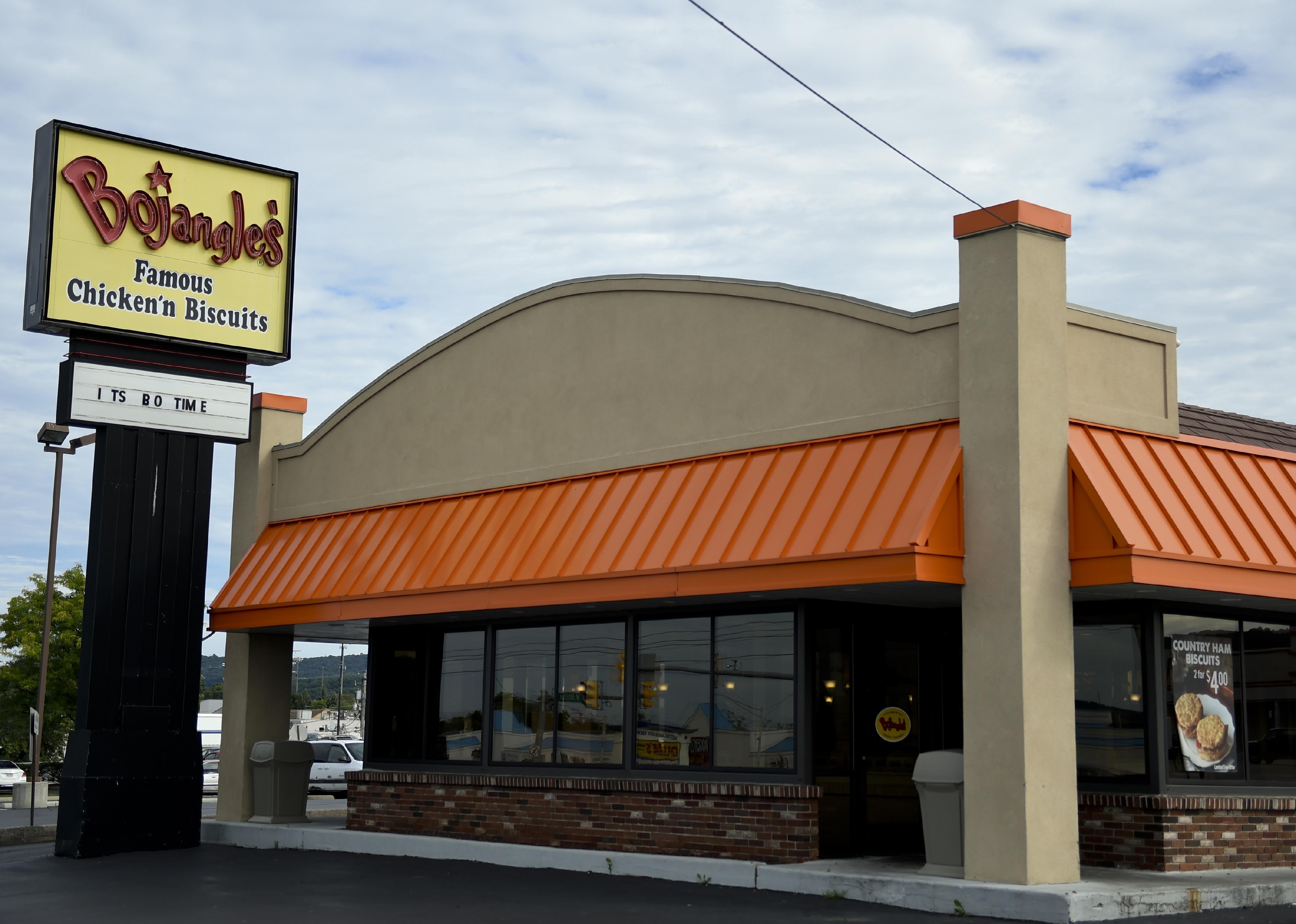A Bojangle's restaurant with an orange awning and yellow sign.