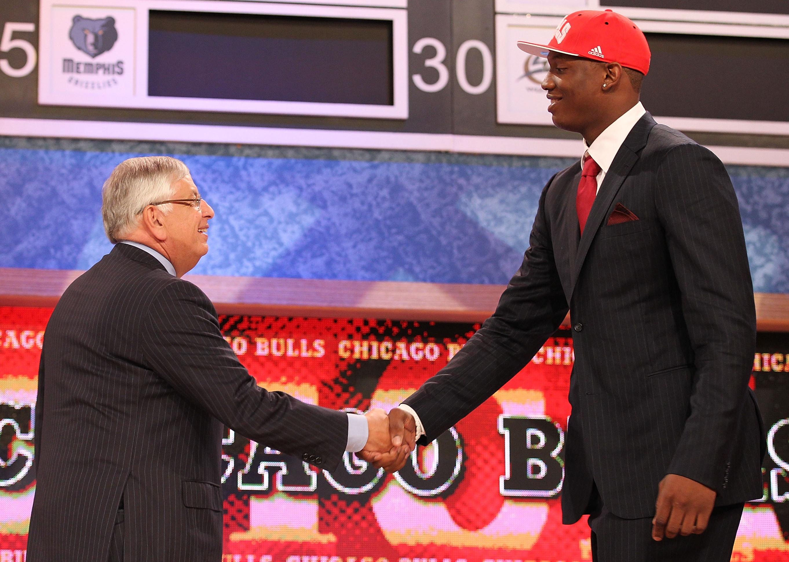 Kevin Seraphin with NBA Commissioner David Stern after being drafted.
