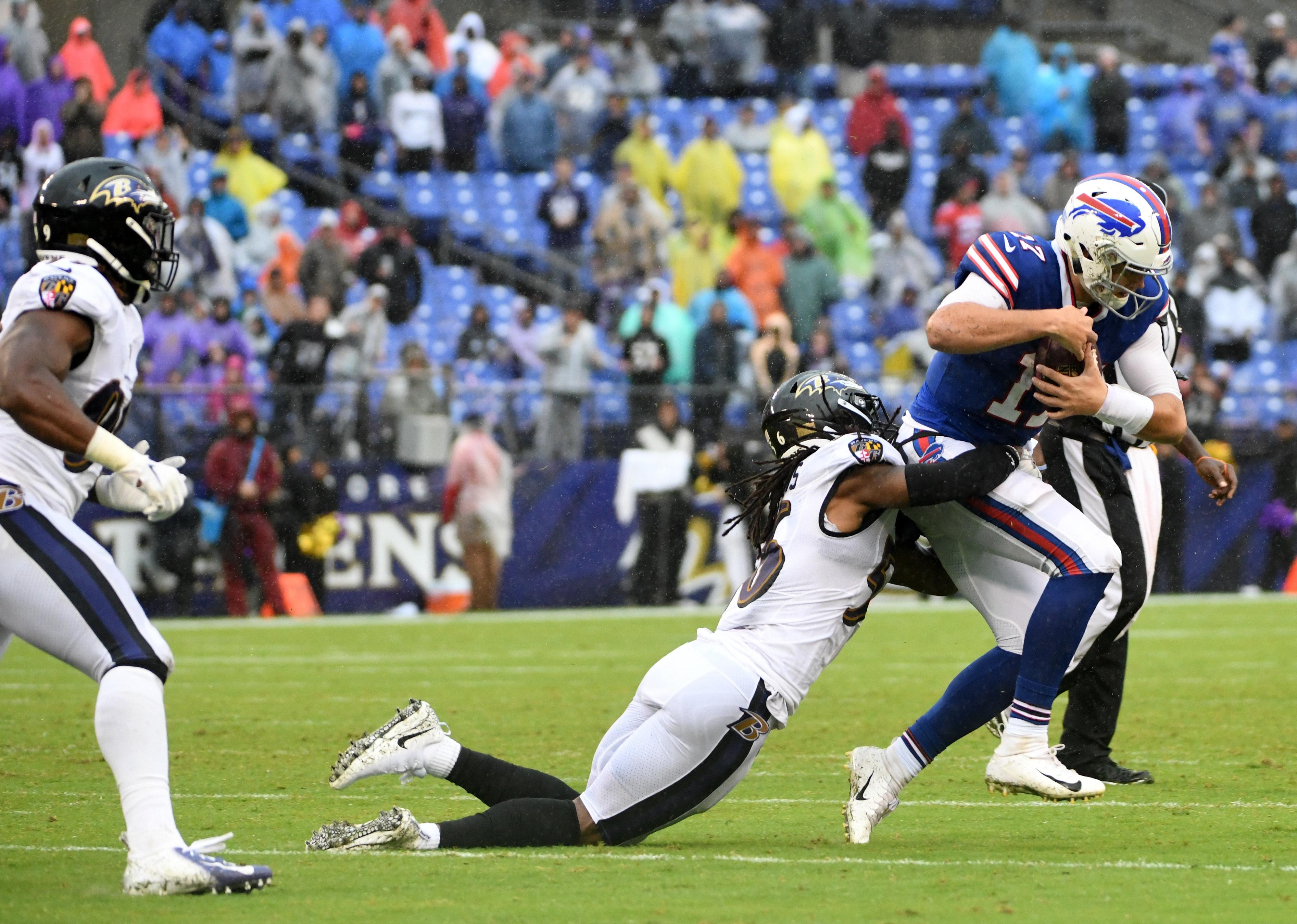 Buffalo Bills quarterback Josh Allen is sacked by Baltimore Ravens linebacker Tim Williams.