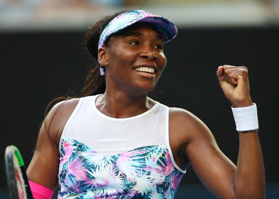 Venus Williams of the United States celebrates after winning a match point 