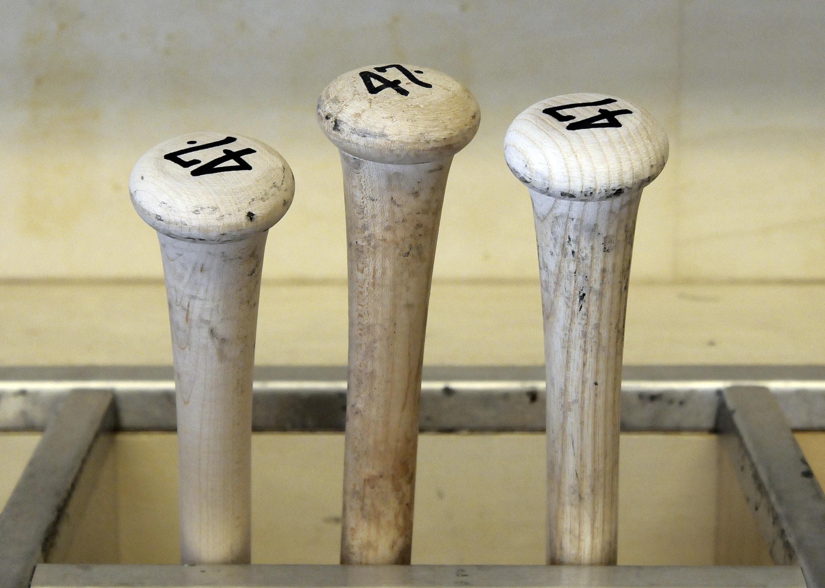 Bats in the bat rack before an MLB game.