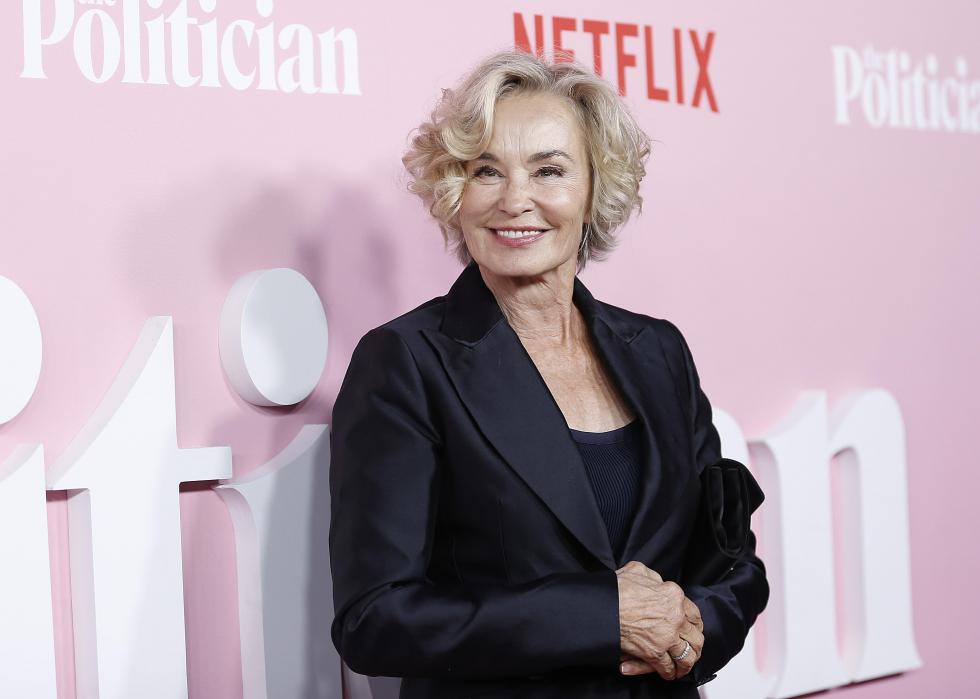 Jessica Lange smiling on the red carpet for an event about Netflix's TV show The Politician. 