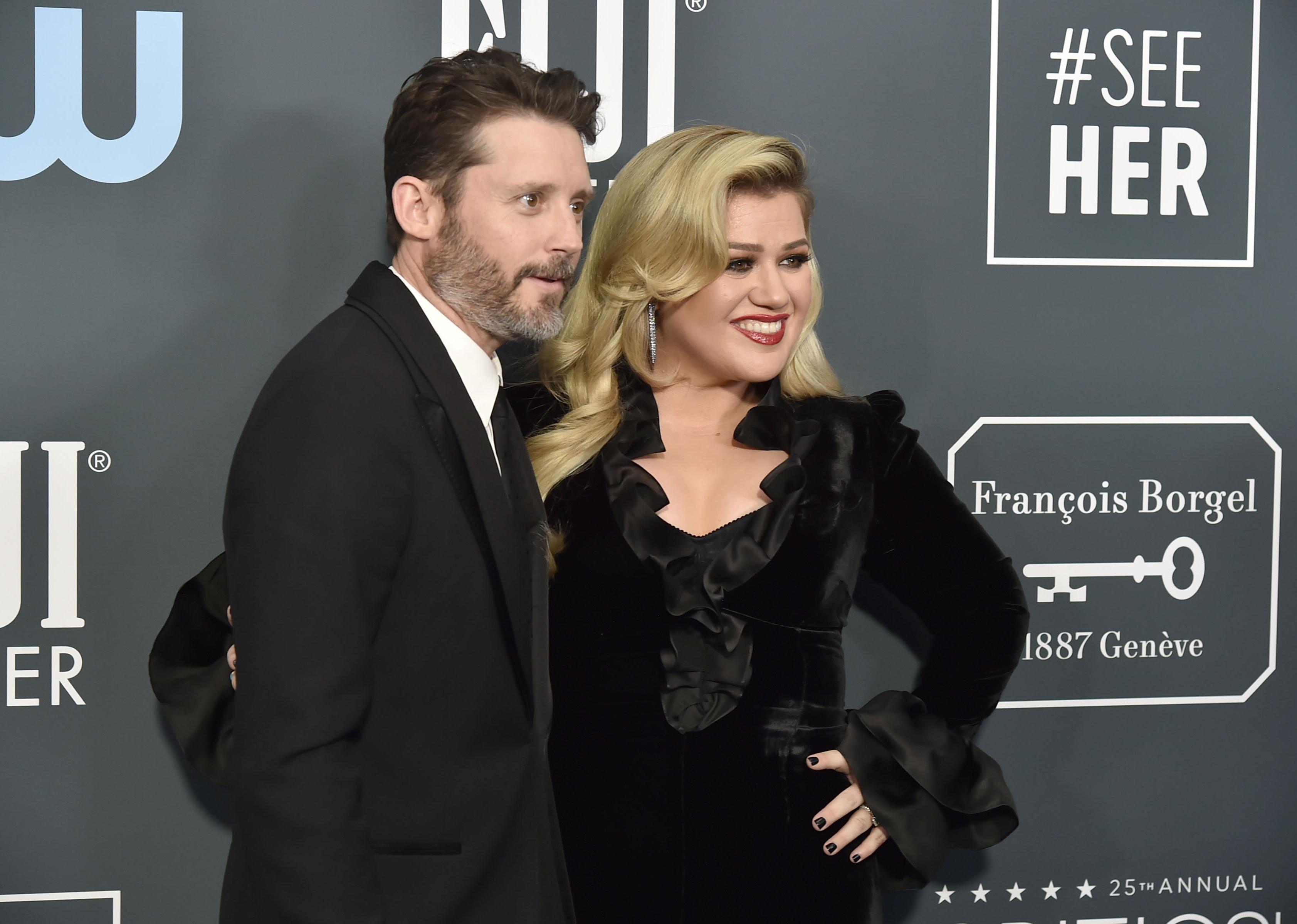 Brandon Blackstock and Kelly Clarkson during arrivals for the 25th Annual Critics' Choice Awards.