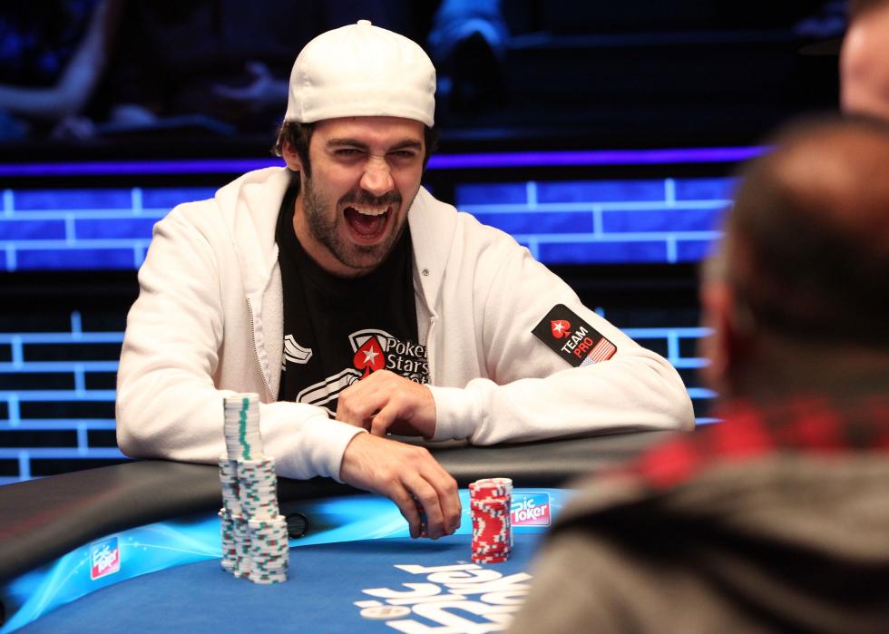Jason Mercier laughs with players as he competes at the final table of the Epic Poker League Inaugural Season.