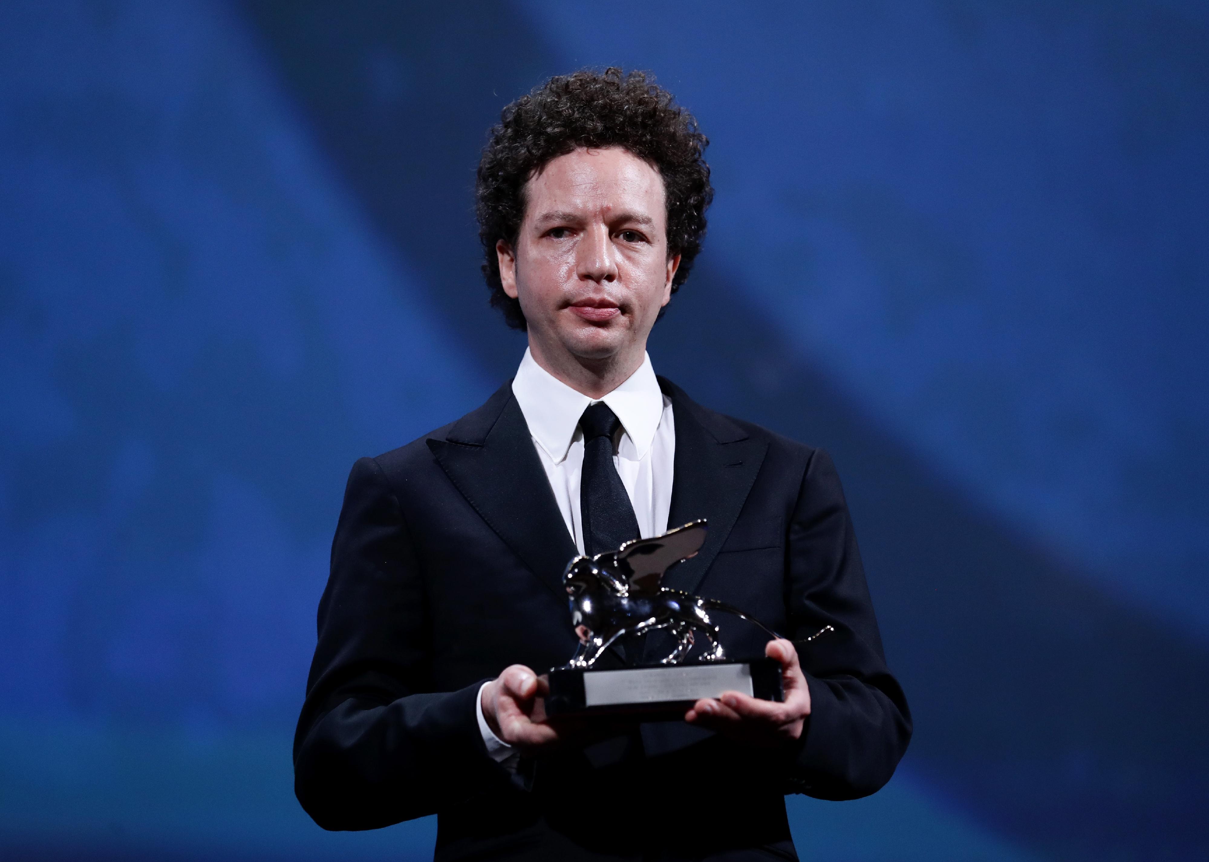 Michel Franco poses with the Silver Lion - Award for Best Director.