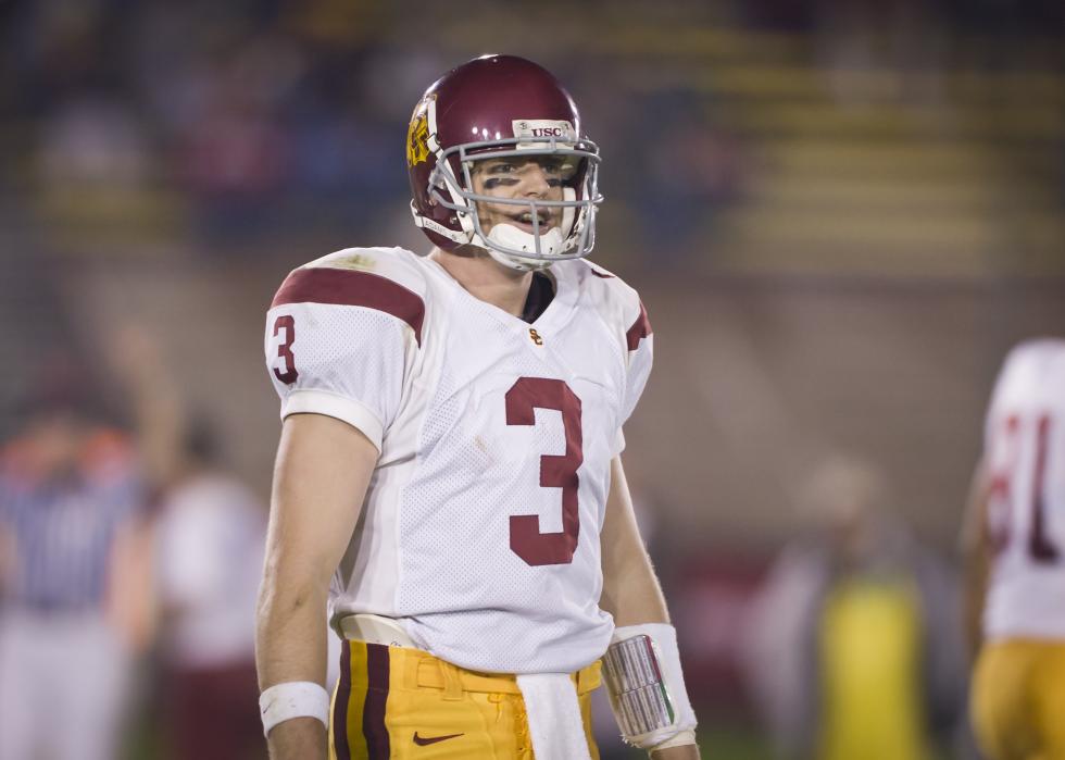 Carson Palmer of the USC Trojans looks to the sidelines during an NCAA football game.