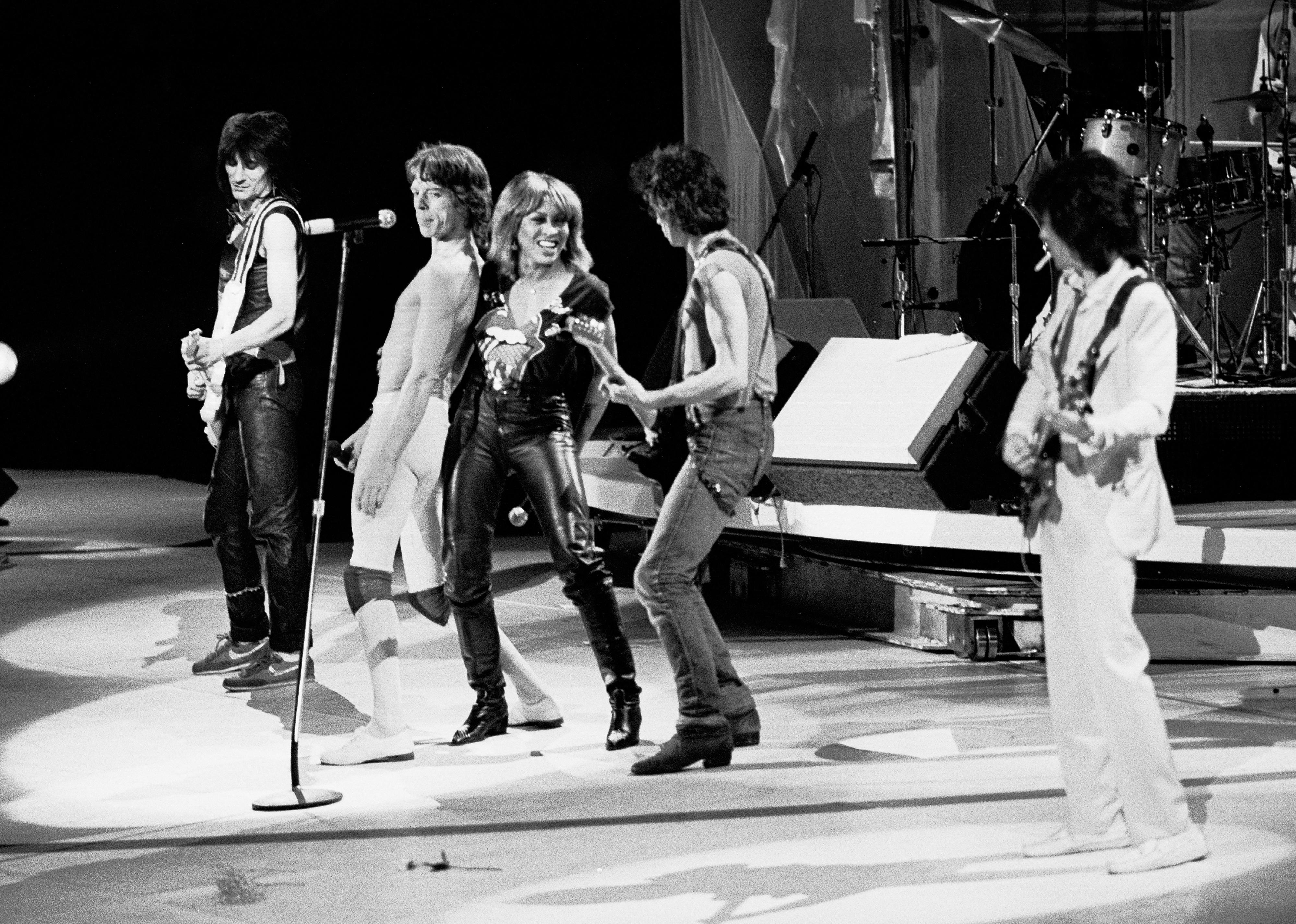 Rolling Stones perform onstage with guest Tina Turner.