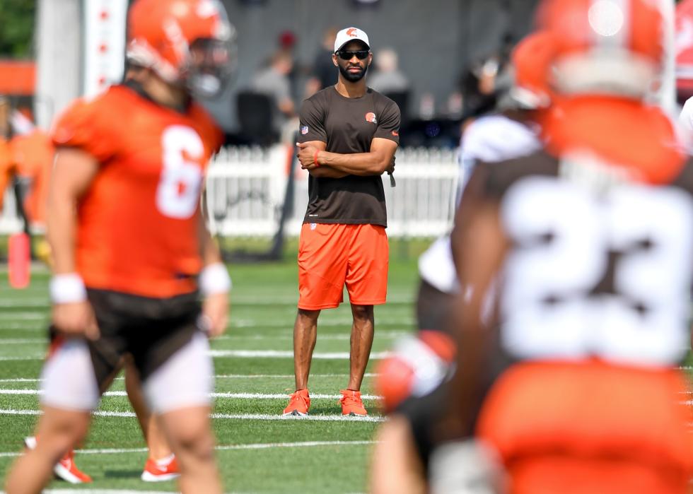 General manager Andrew Berry of the Cleveland Browns watches practice during Cleveland Browns Training Camp