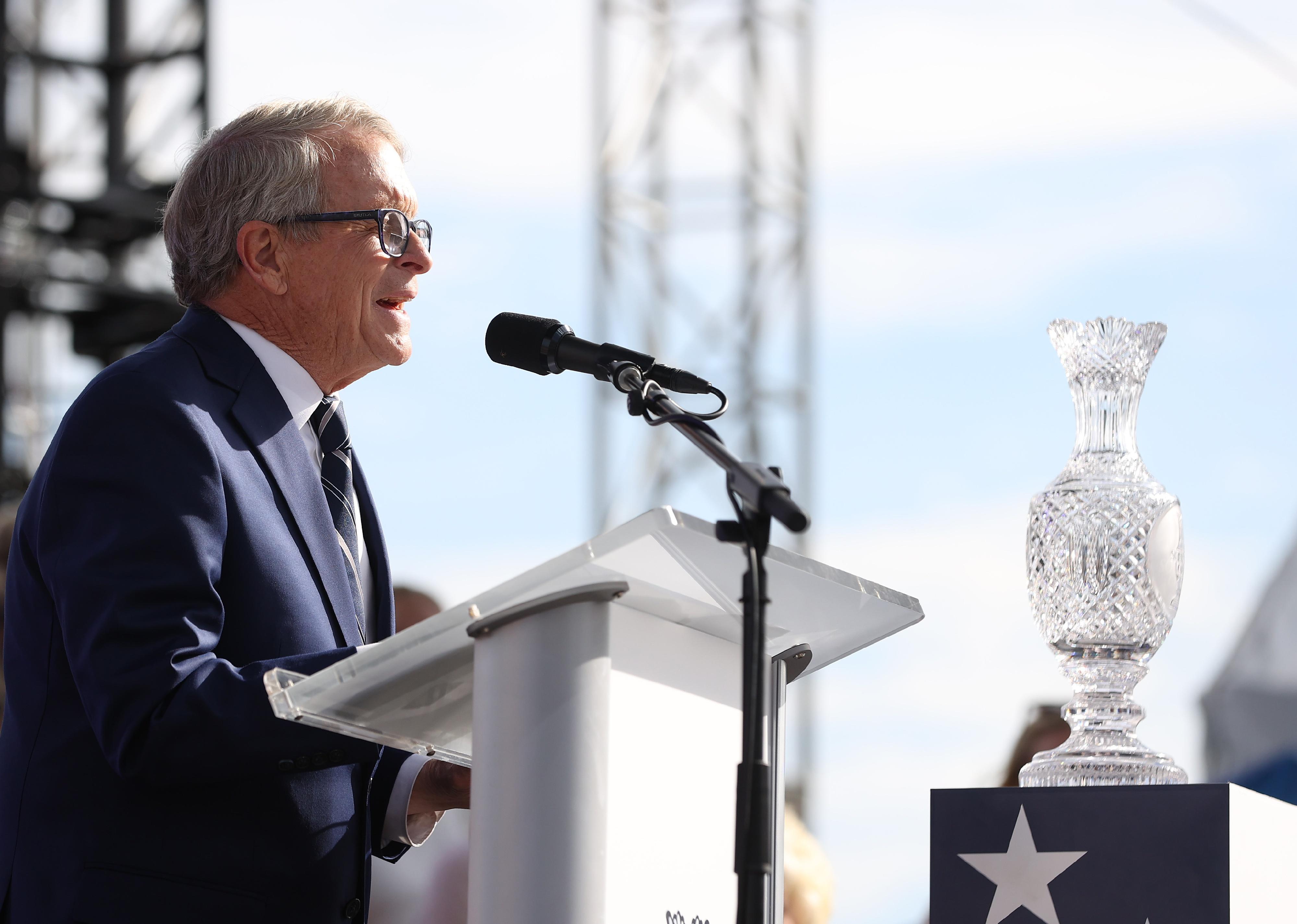 Ohio Governor Mike DeWine speaks to the crowd during the Solheim Cup Opening Ceremony