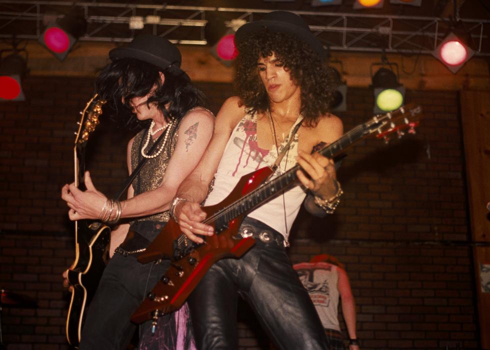 Izzy Stradlin and Slash of the rock band 'Guns n' Roses' perform onstage at the Troubadour.