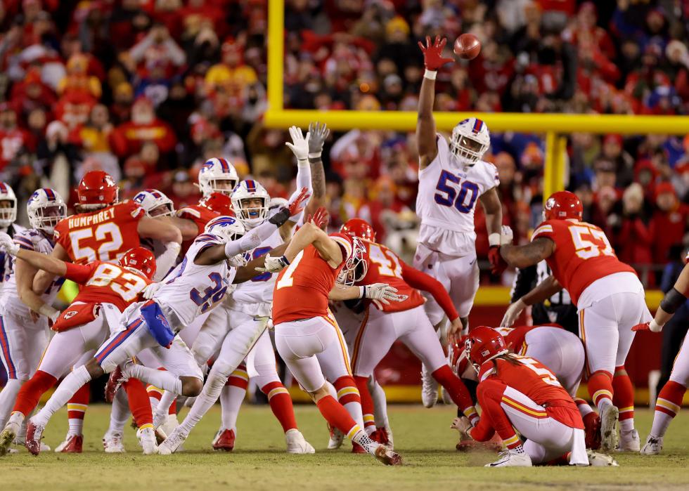 Harrison Butker of the Kansas City Chiefs kicks the game-tying field goal against the Buffalo Bills