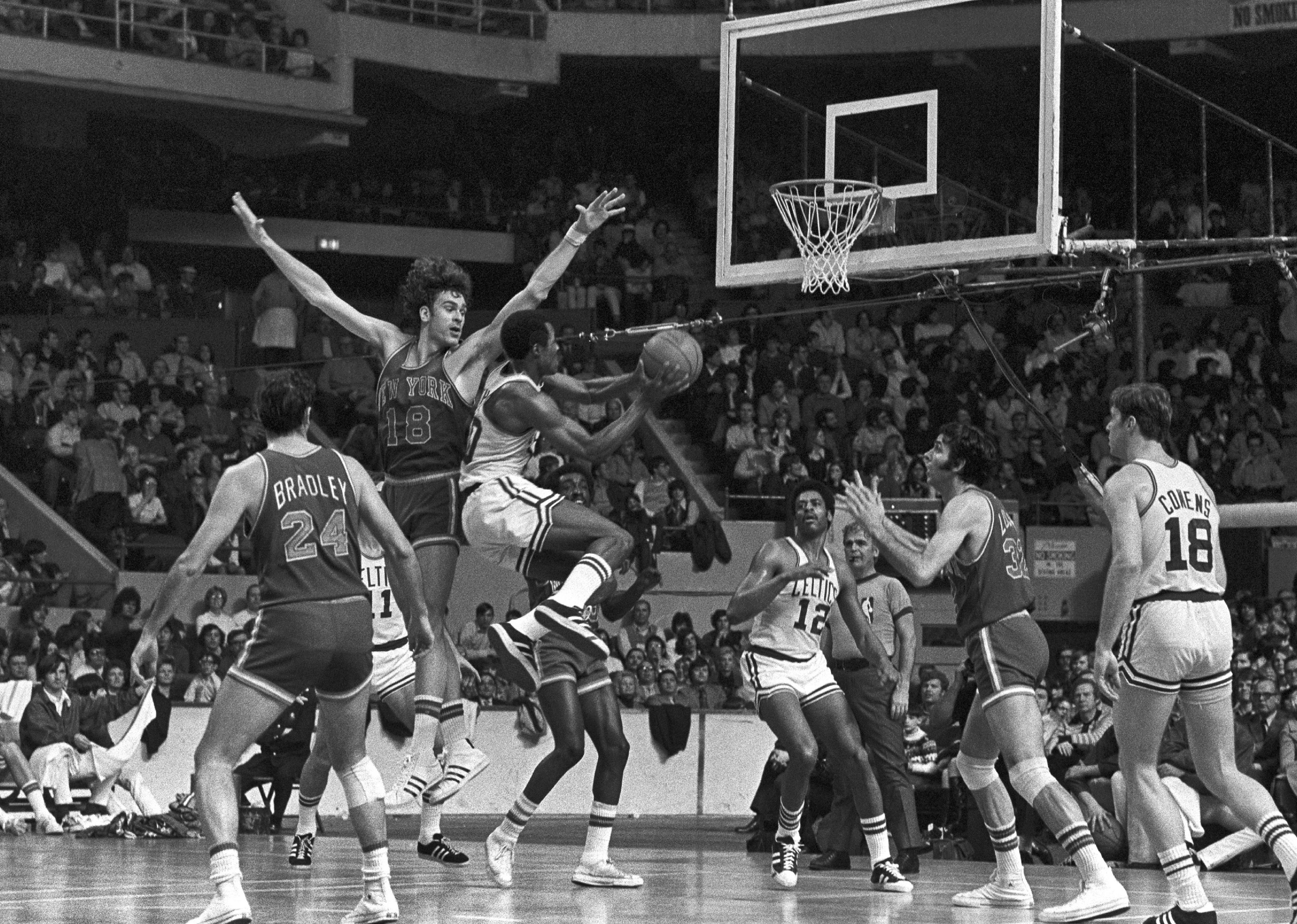 Jo Jo White of the Boston Celtics jumps during a game against the New York Knicks.