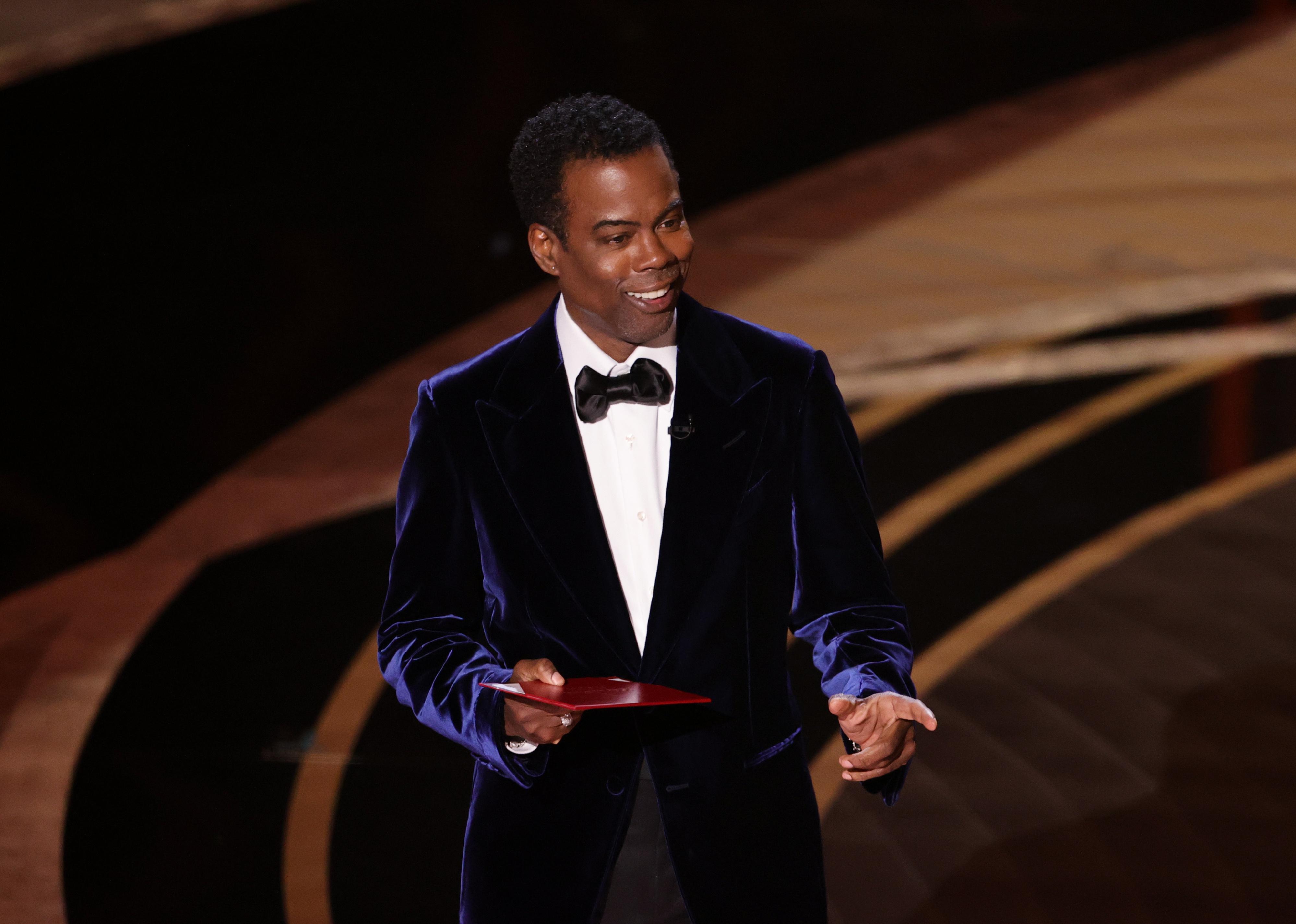 Chris Rock speaks onstage during the 94th Annual Academy Awards.
