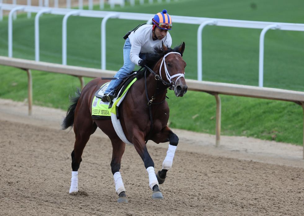 Pioneer of Medina runs on the track during the morning training