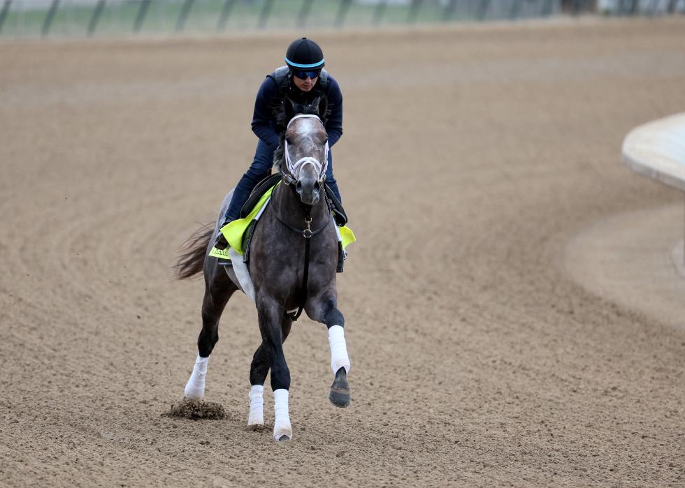 Charge It runs on the track during morning training