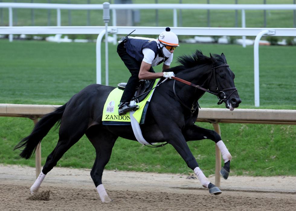 Zandon runs on the track during morning training