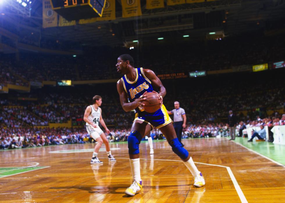 Earvin Magic Johnson looks to make a play 