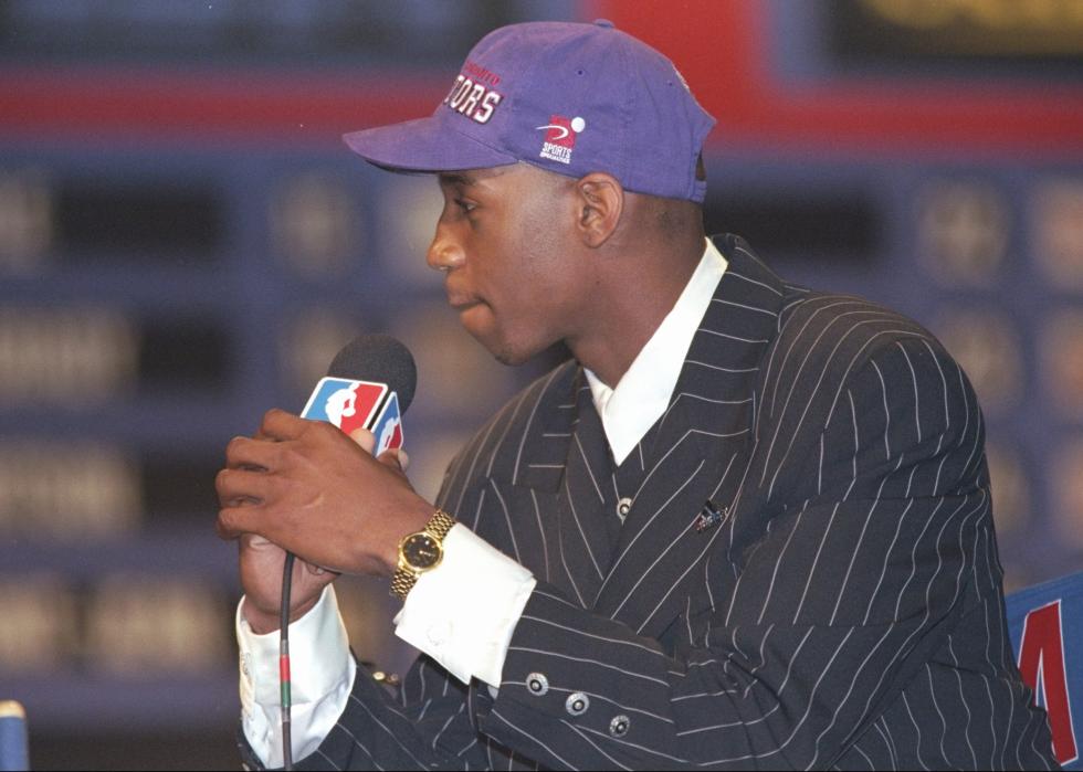 Tracy McGrady of the Toronto Raptors speaks with a reporter during the NBA Draft.