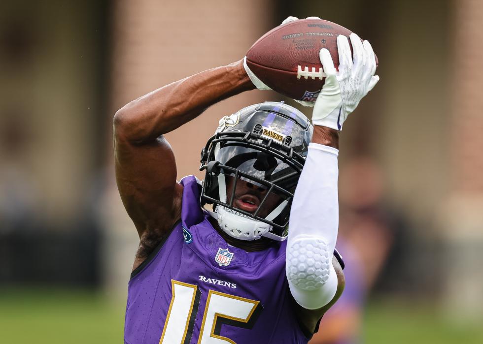 Nelson Agholor of the Baltimore Ravens catches a ball during training camp.