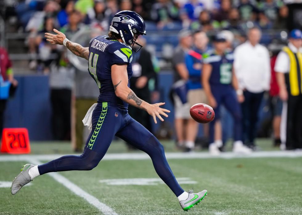 Punter Michael Dickson of the Seattle Seahawks punts the football.