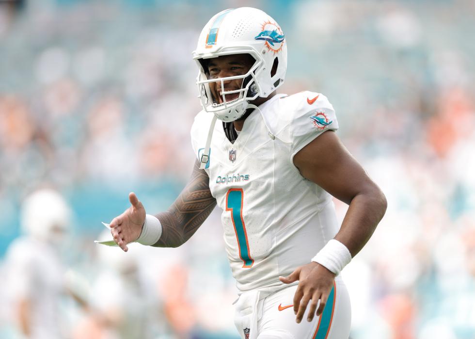 Tua Tagovailoa of the Miami Dolphins reacts after a touchdown.