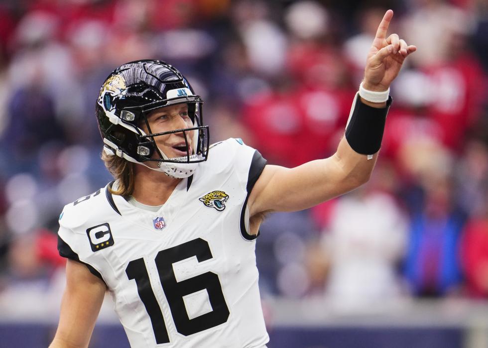 Trevor Lawrence of the Jacksonville Jaguars celebrates after scoring a touchdown.