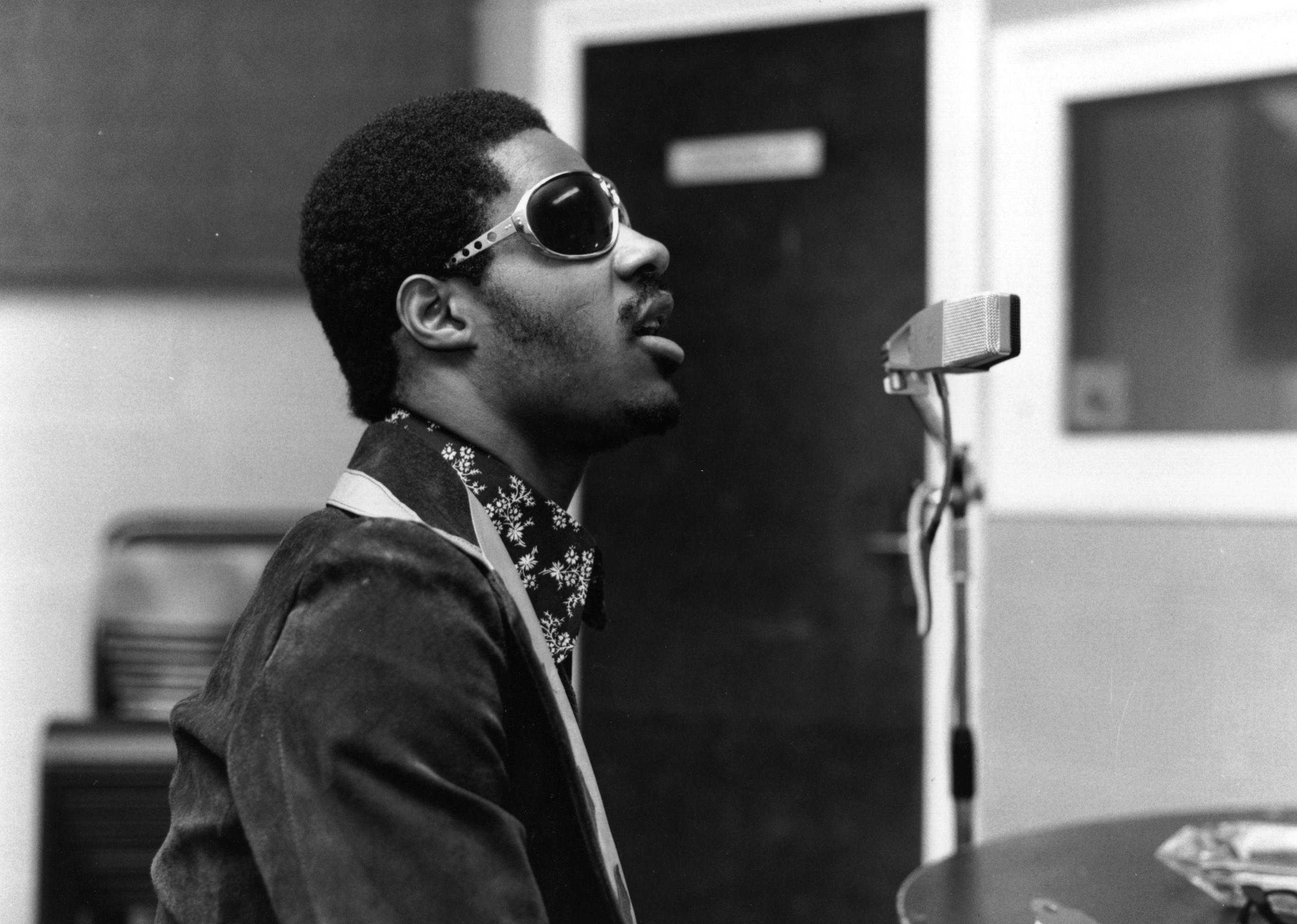 Stevie Wonder at work in a recording studio. 