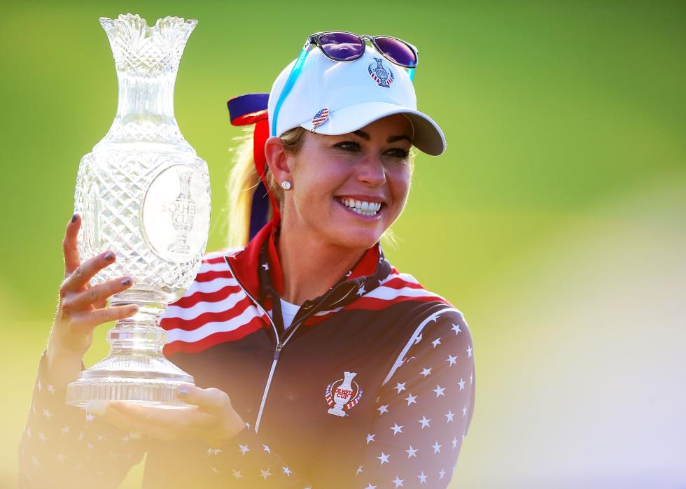  Paula Creamer poses with a trophy