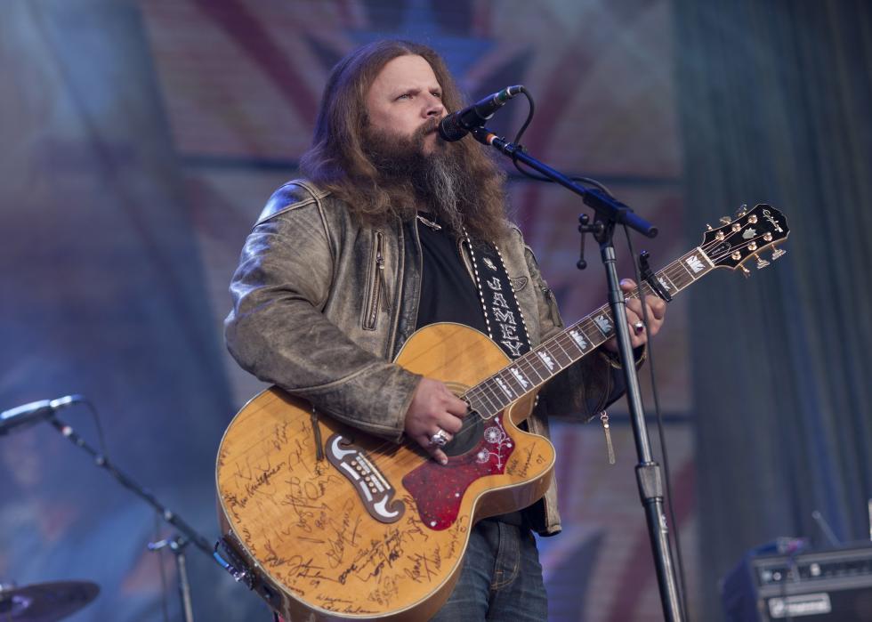 Jamey Johnson performs onstage during the Farm Aid benefit concert.