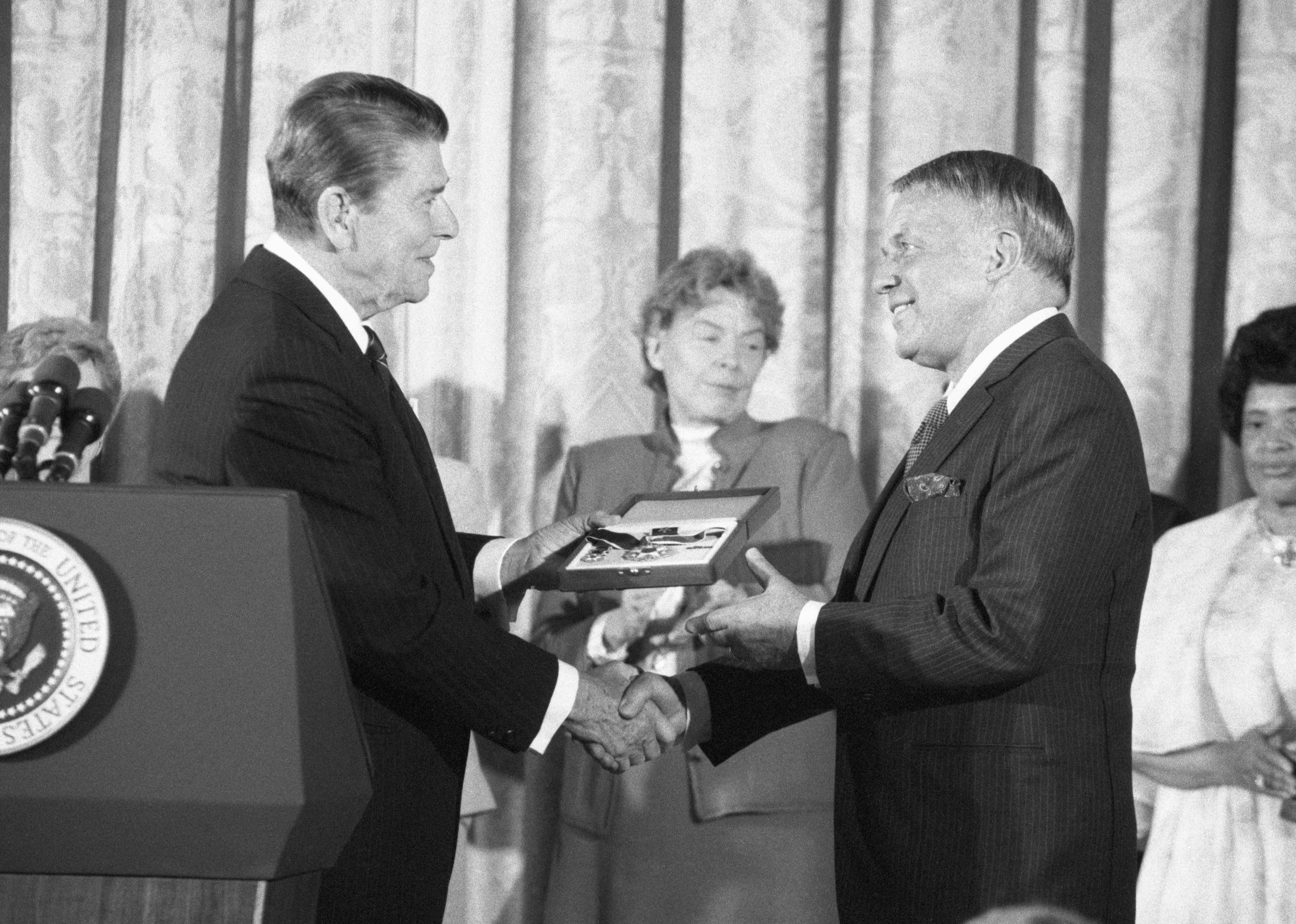 President Ronald Reagan awards the Medal of Freedom to singer Frank Sinatra.