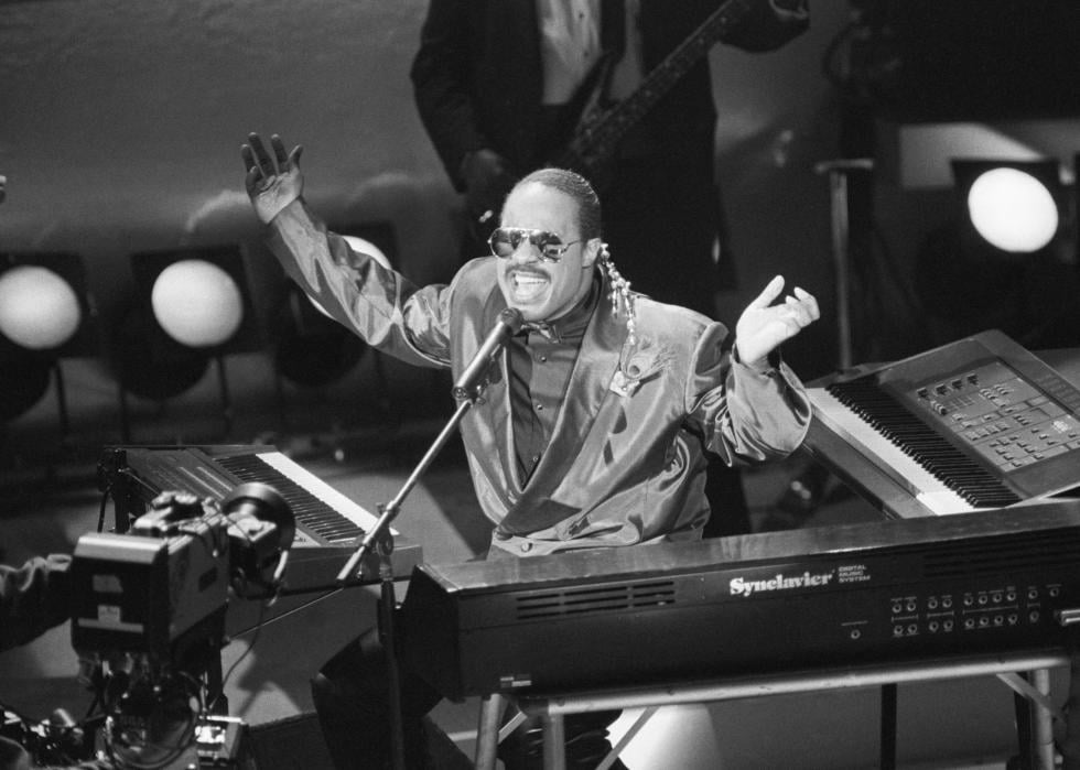 Stevie Wonder performing.