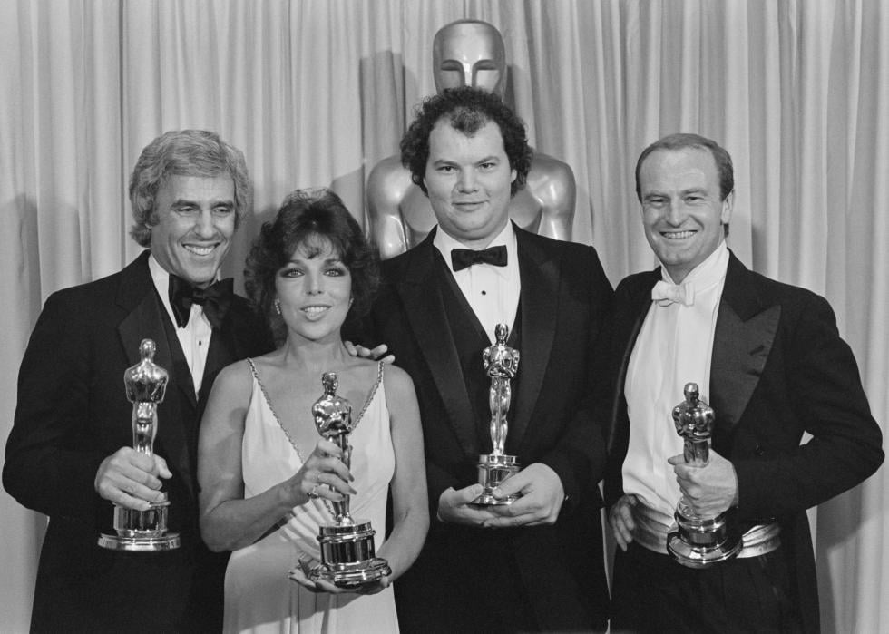 Burt Bachrach, Carole Bayer Sager, Christopher Cross, and Peter Allen holding their Oscars for the song from the movie Arthur, 1981.