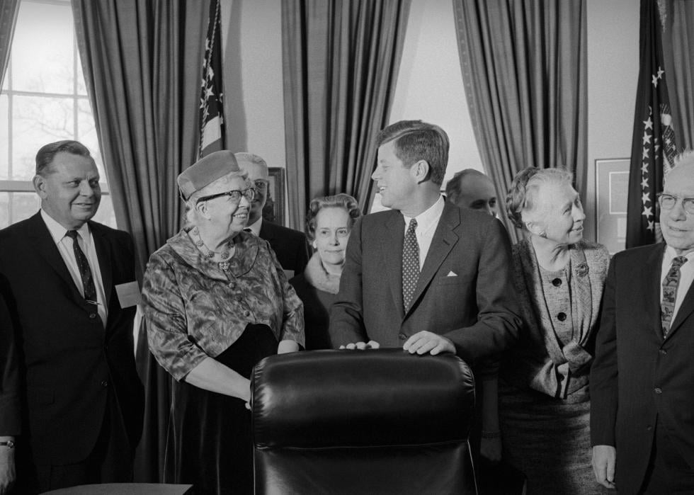 President Kennedy meets with the commission which he appointed to examine the status of women