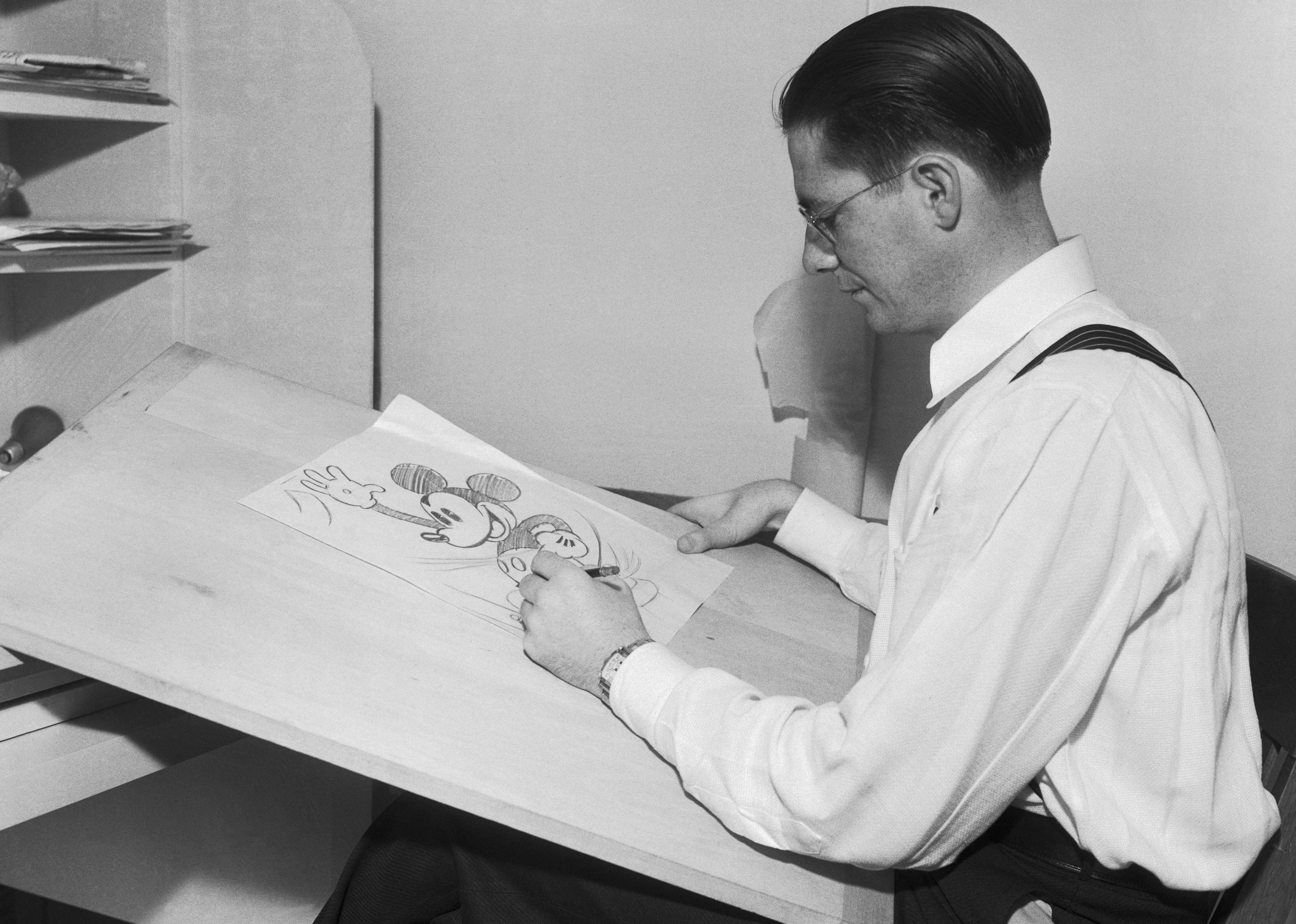 Animator drawing Mickey Mouse at Disney Studios.