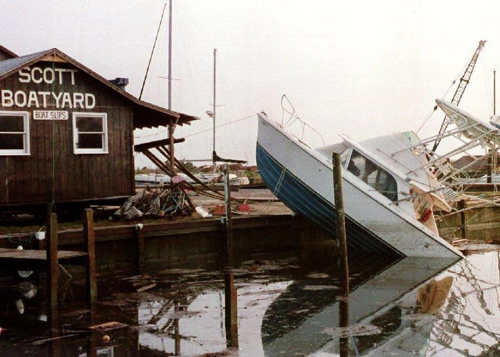 A small boat crashed onto the dock of the Scott Boat Yard.