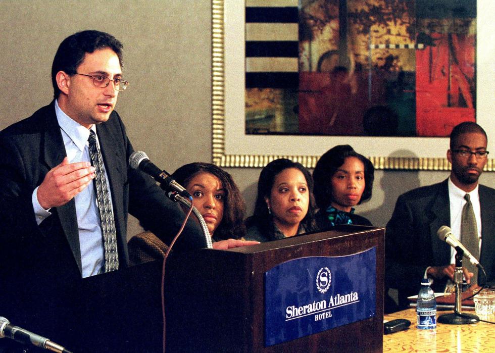 Defense attorney Cyrus Mehri at a press conference on the racial discrimination settlement with Coca-Cola 
