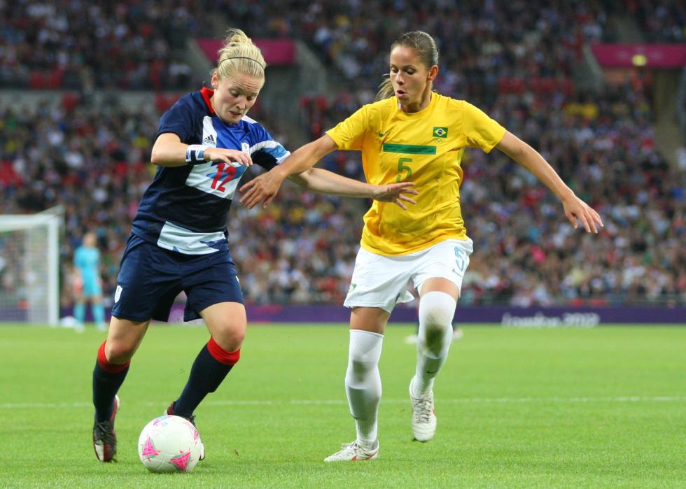 Kim Little of GB and Erika of Brazil battle during the 2012 Olympic Games