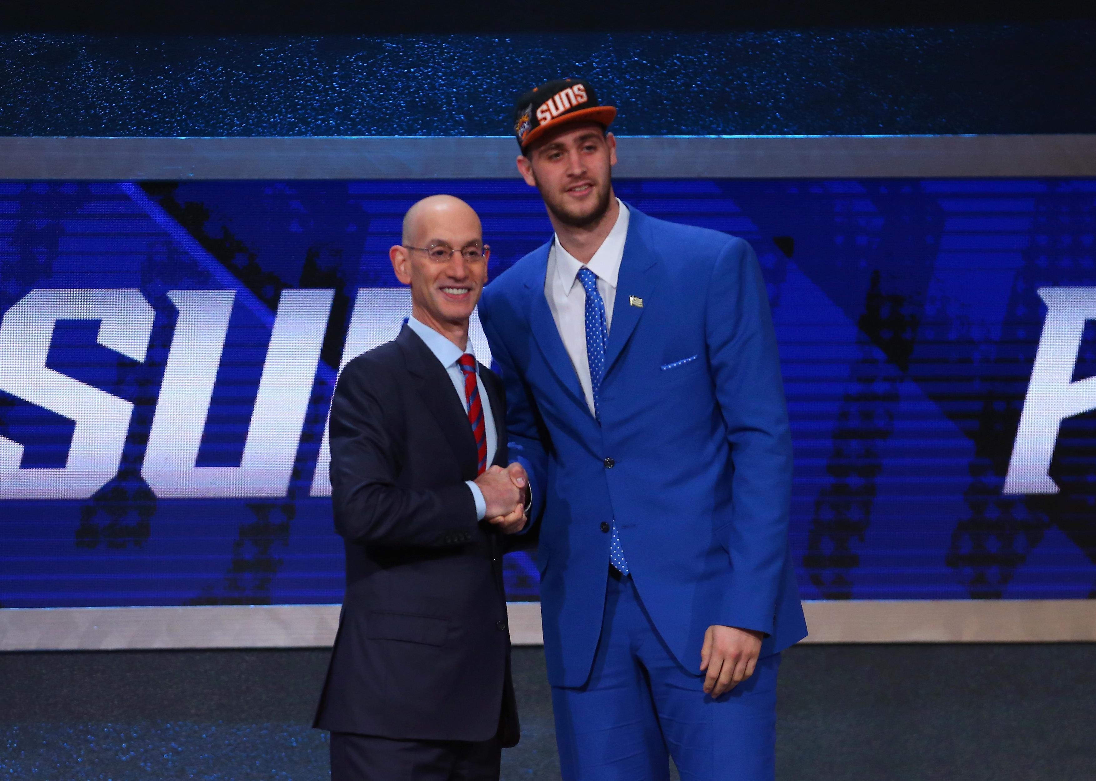 Georgios Papagiannis with Commissioner Adam Silver after being drafted.