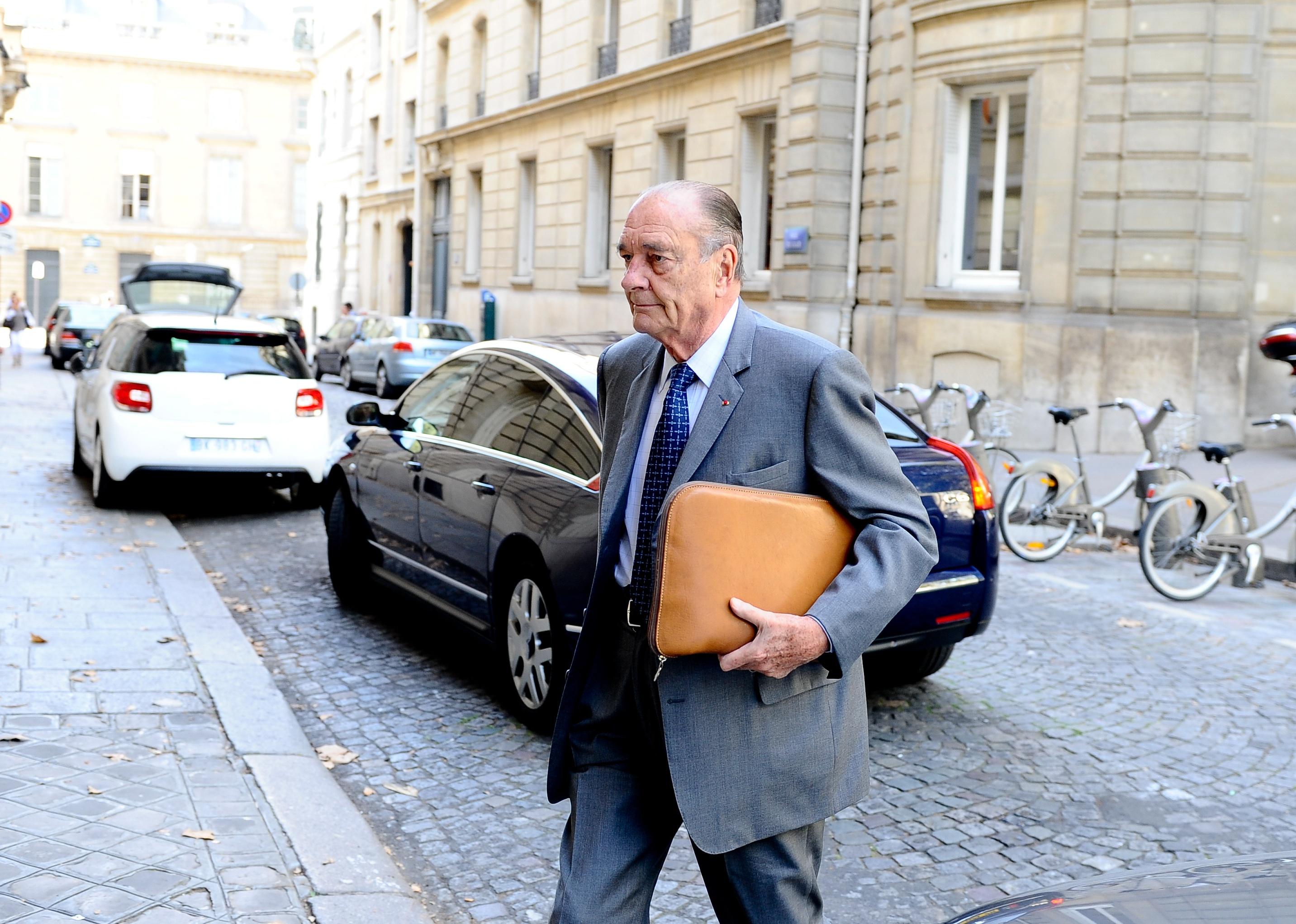 Jacques Chirac arrives at his office