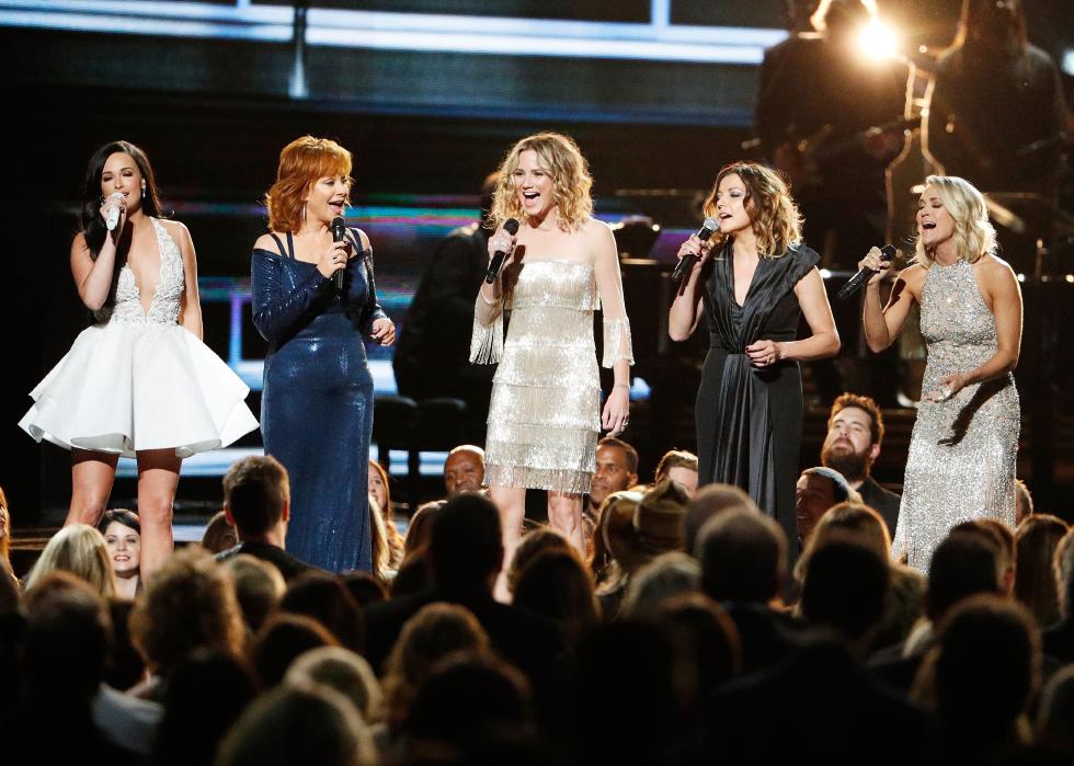 Kacey Musgraves, Reba McEntire, Jennifer Nettles, Karen Fairchild, and Carrie Underwood perform onstage