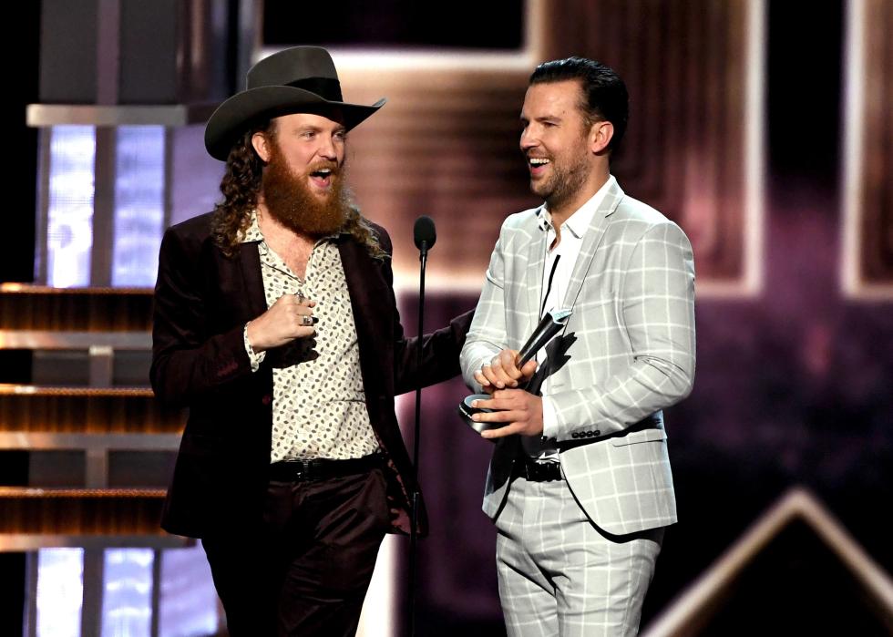 John Osborne and T.J. Osborne accept an award